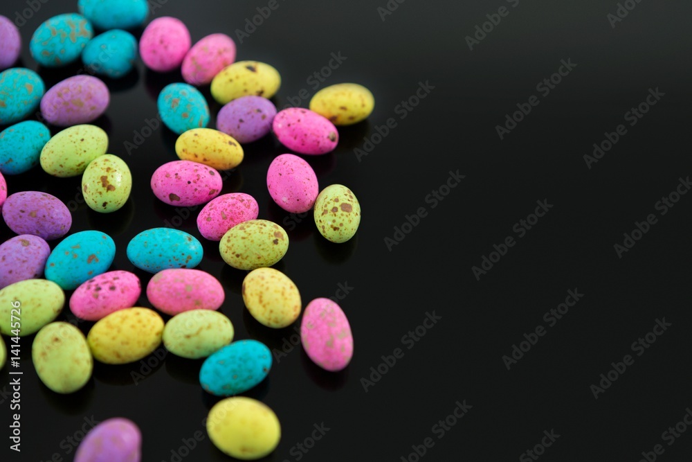 Multicolored Easter eggs on black background Multicolored Easter eggs on black background