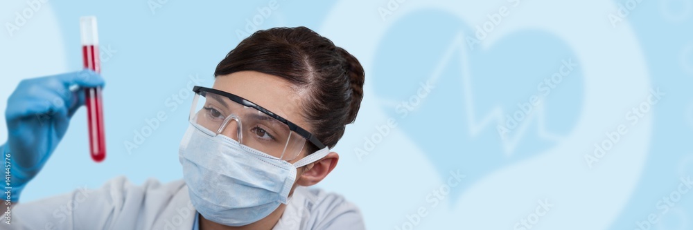 Composite image of female scientist holding test tube Composite image of female scientist holding test tube