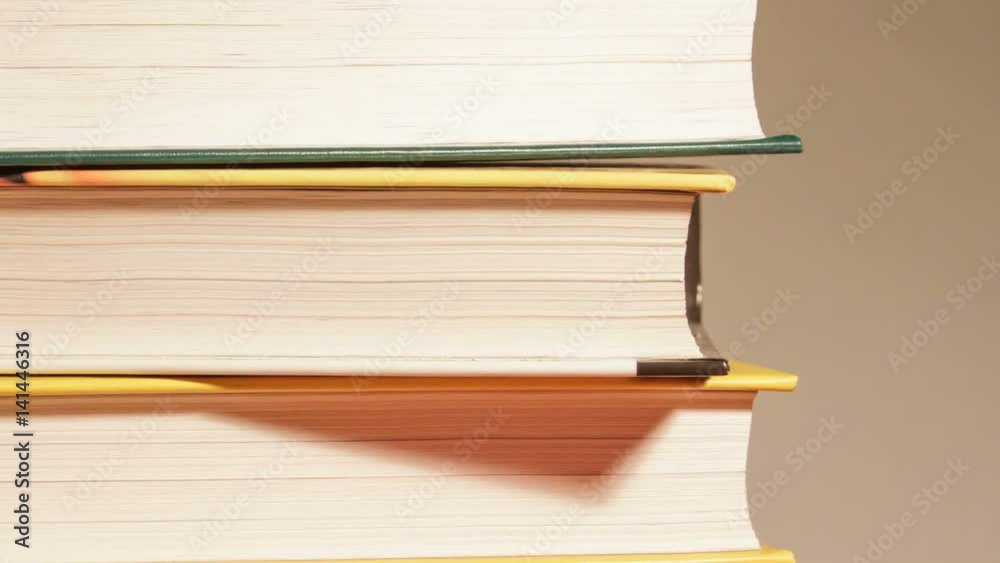 New Books On Stack Standing. Books on wooden table. Dolly Camera. Smooth Motion. New Books On Stack Standing. Books on wooden table. Dolly Camera. Smooth Motion.