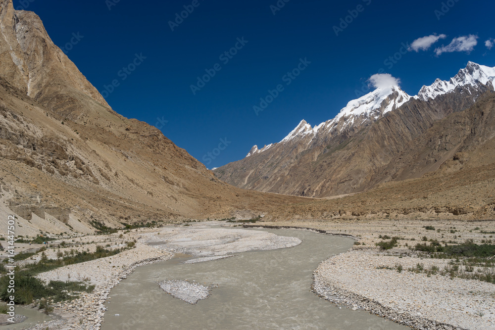 Fototapeta premium Curve of river and trail o K2 base camp, K2 trek, Pakistan