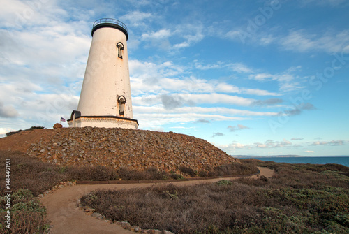 Lighthouse at Piedras Blancas point at cloudy sunset on the Central Coast of California USA