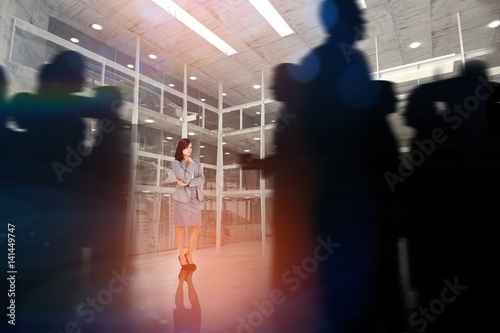 Wallpaper Mural Composite image of silhouette of business people walking Torontodigital.ca
