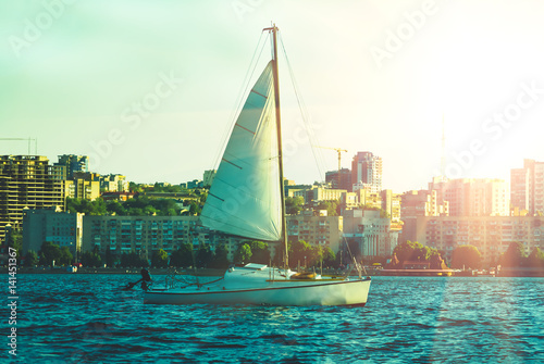 Sailing yacht against the backdrop of the city