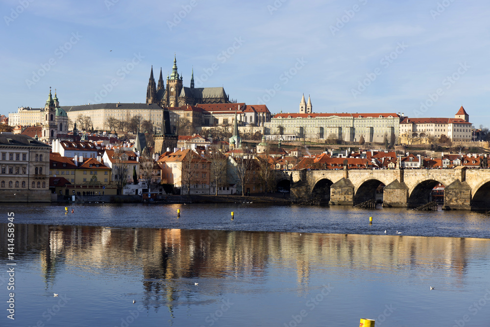 View on the autumn Prague gothic Castle with the Charles Bridge, Czech Republic