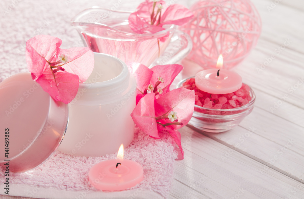 Spa set with towel, candles, salt and flowers Spa set with towel, candles, salt and flowers