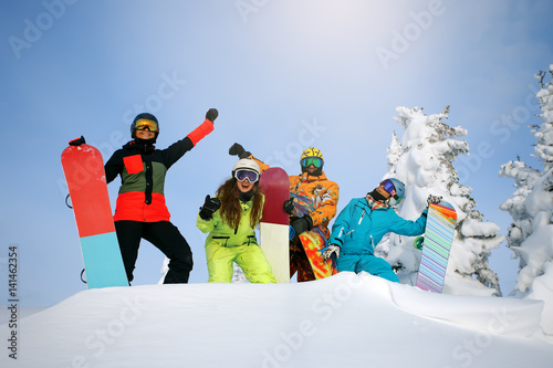 Group happy friends having fun at Sheregesh ski resort.