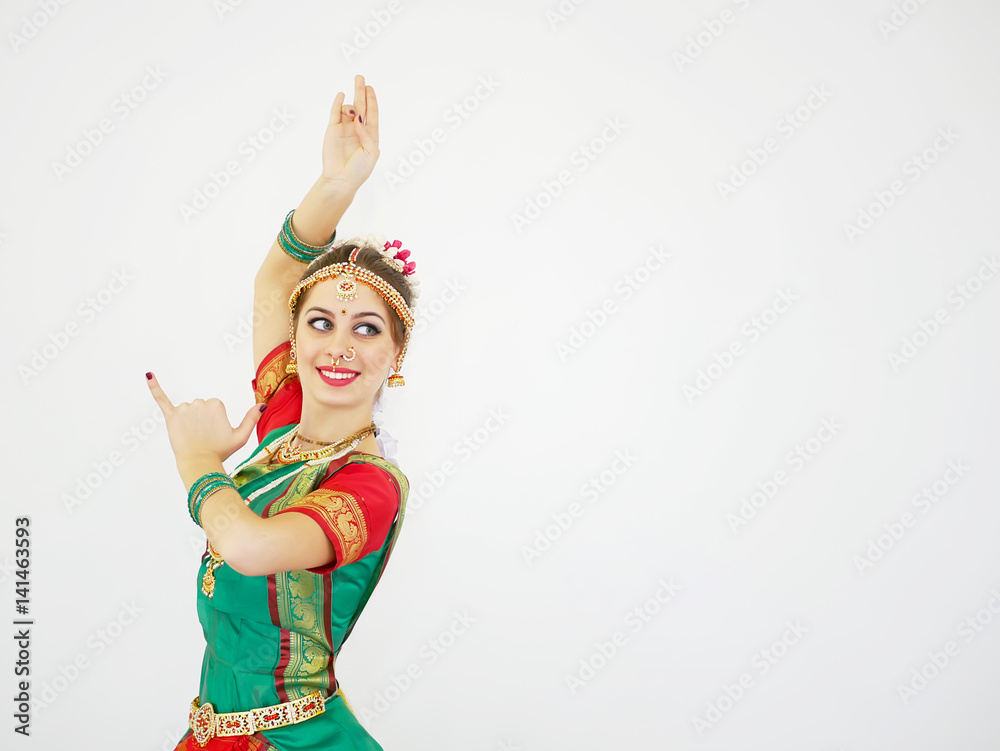 Beautiful Indian dancer on a white background