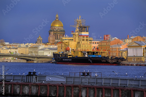 Landscape of Saint-Petersburg. View of the Neva, Isaakievsky Cathedral and the icebreaker photo