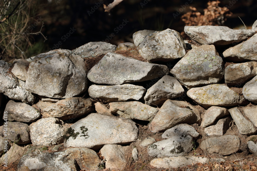 Fond de mur de pierre séche