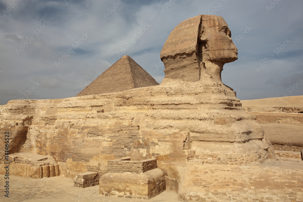 The Sphinx at Giza and ancient Egyptian pyramid in Giza, Cairo