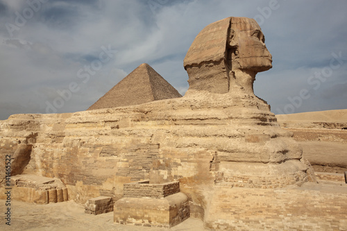 The Sphinx at Giza and ancient Egyptian pyramid in Giza  Cairo
