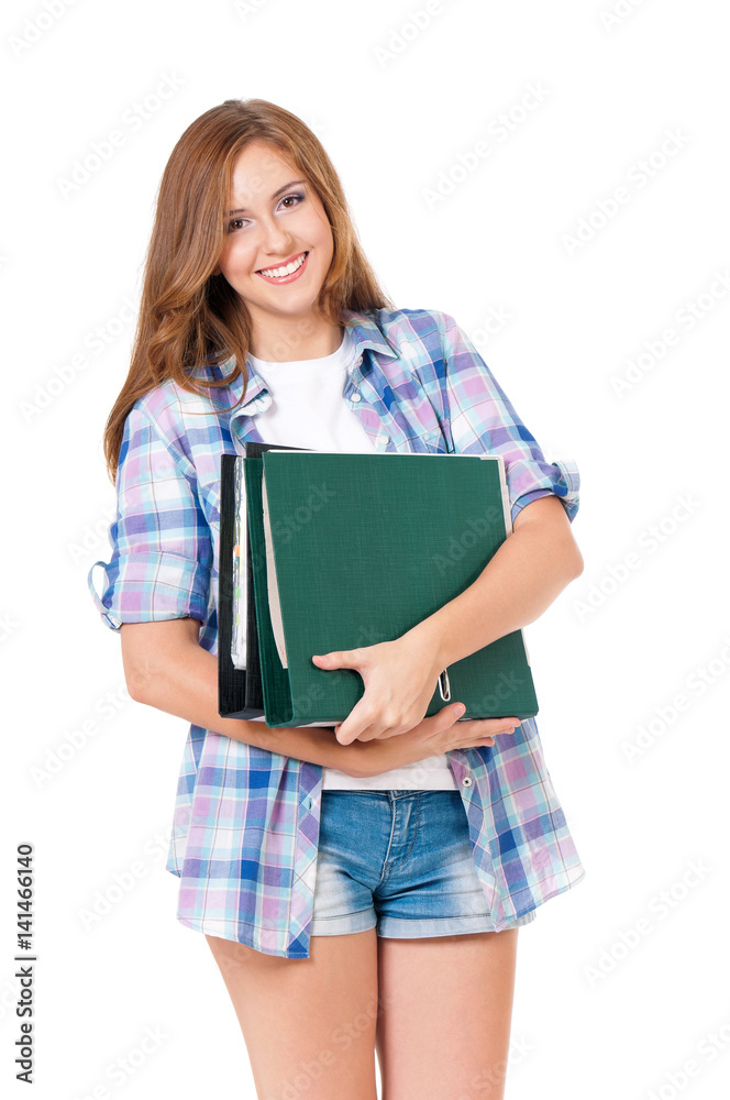 Beautiful teen girl with folders, isolated on white background Beautiful teen girl with folders, isolated on white background