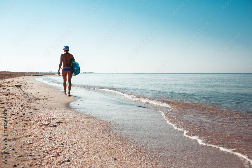 Beautiful sexy surfer girl on the beach Beautiful sexy surfer girl on the beach