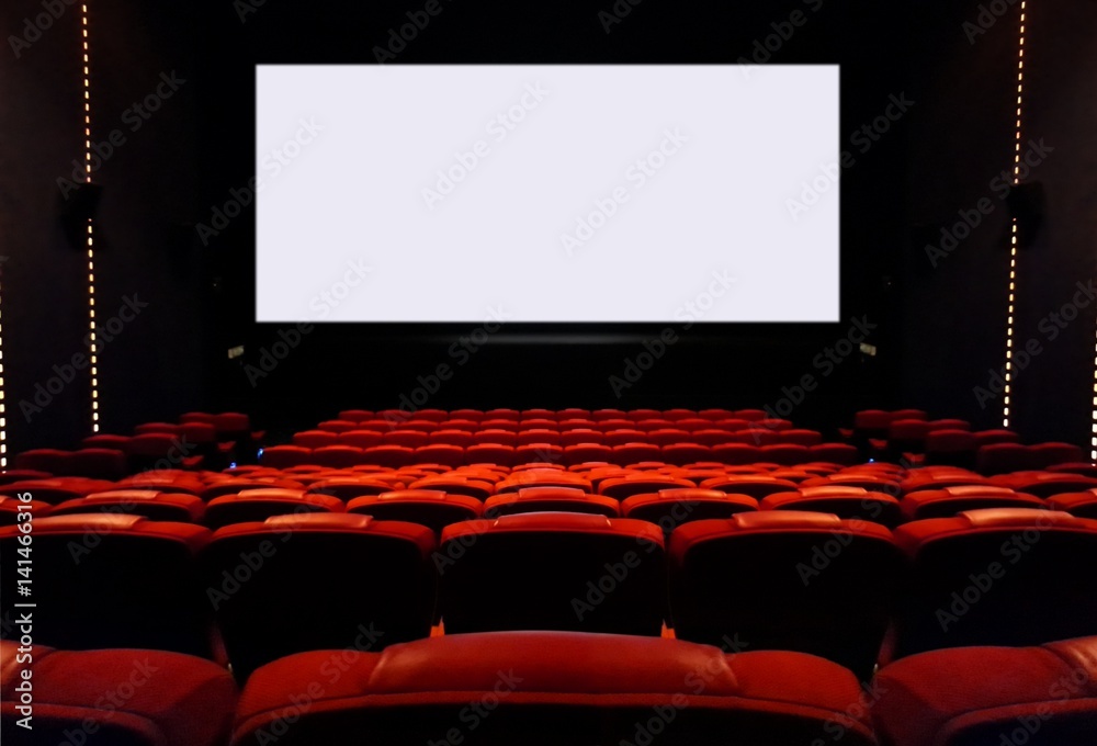 Obraz premium Empty cinema seats with blank white screen