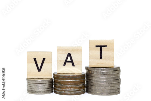 Stack money coin with vat word