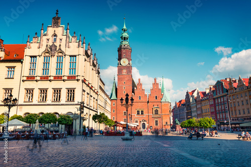 Colorful morning scene on Wroclaw Market Square with Town Hall.