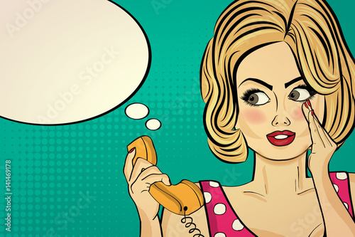 Sexy pop art woman talking on a retro phone