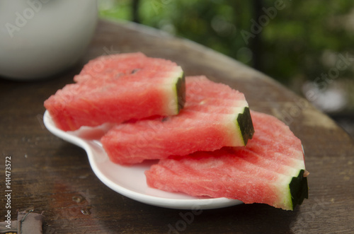 Slice watermelon on dish