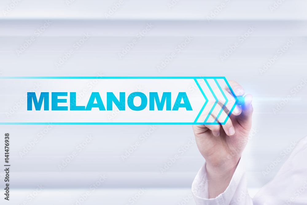 Naklejka premium Medical doctor drawing melanoma on the virtual screen.