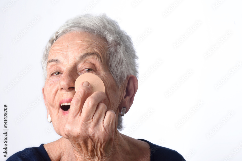 Senior woman make-up face on white background Senior woman make-up face on white background