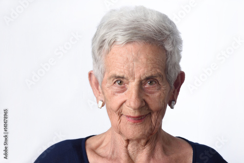 Cuadro en lienzo portrait of a senior woman on white background