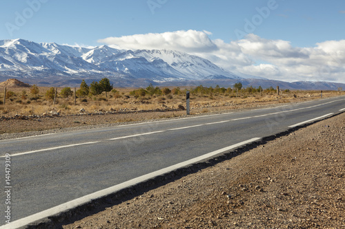 Empty road in landscape with Atlas mountains, Morocco