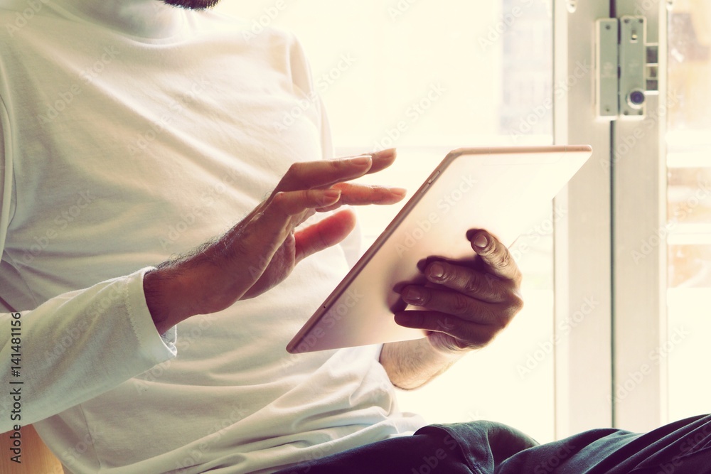 Man using laptop in vintage color
