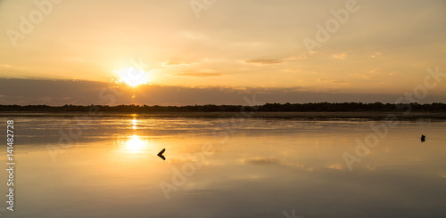 sunset on the lake as a backdrop