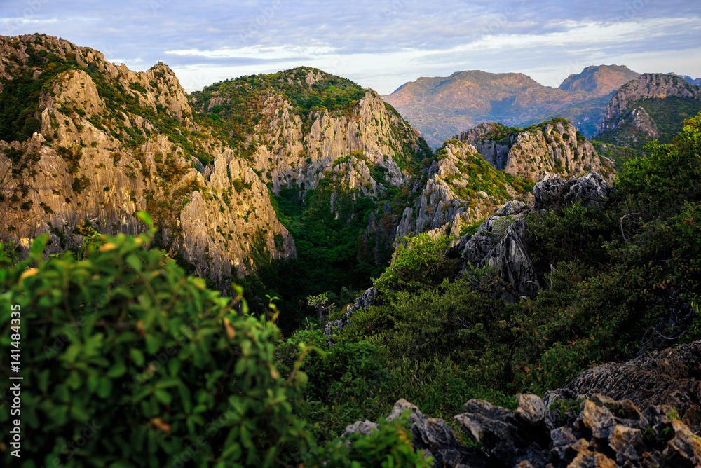 Steep rock mountains with high peak in the national park in Thailand.