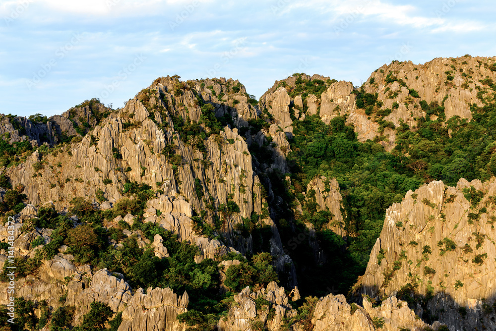Steep rock mountains with high peak in the national park in Thailand.