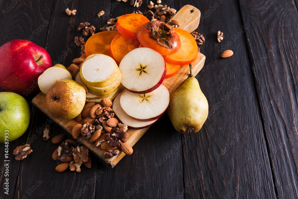 Healthy food - wooden board with fruits, flat lay Healthy food - wooden board with fruits, flat lay