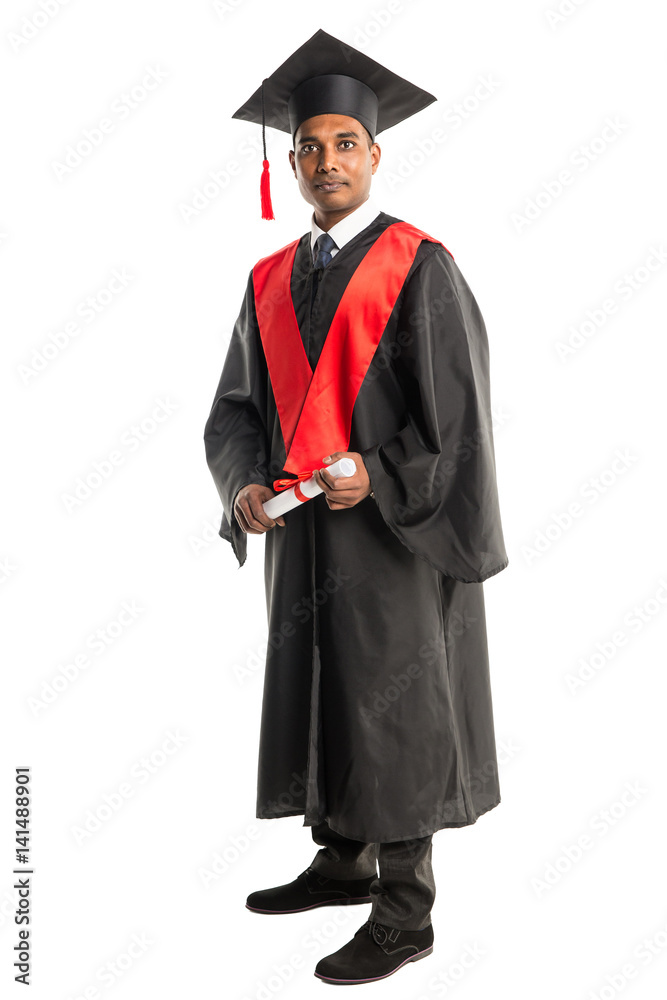 Male african american graduate in gown and cap Male african american graduate in gown and cap