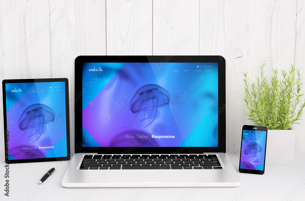 devices on table with cool responsive design website devices on table with cool responsive design website