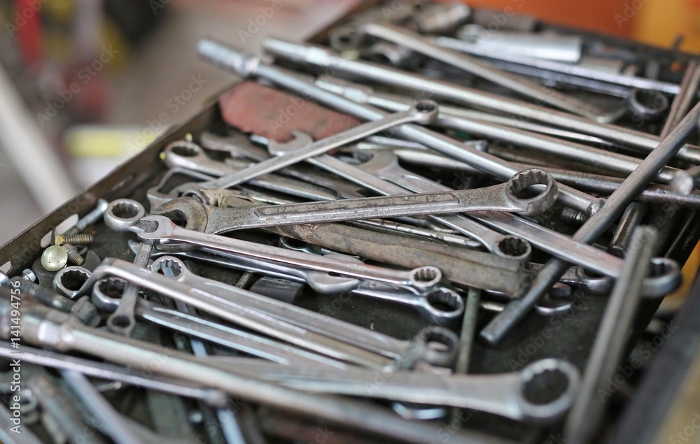 Dirty set of hand tools background. Tools and wrench. Many old wrench and tools in box. Dirty set of hand tools background. Tools and wrench. Many old wrench and tools in box.