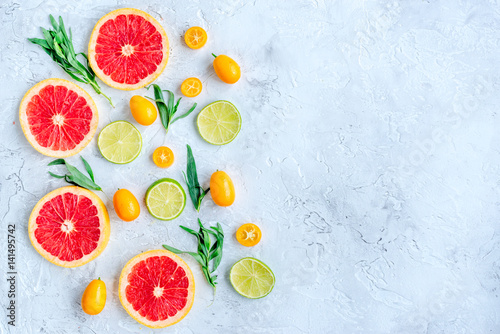 Naklejka Cytrusy na białym kamieniu