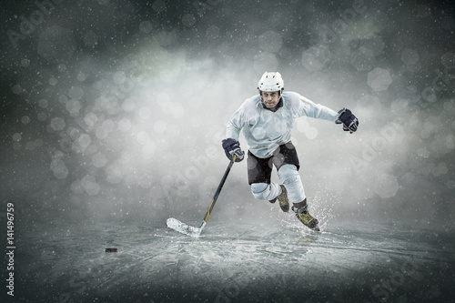 Ice hockey player on the ice  outdoors