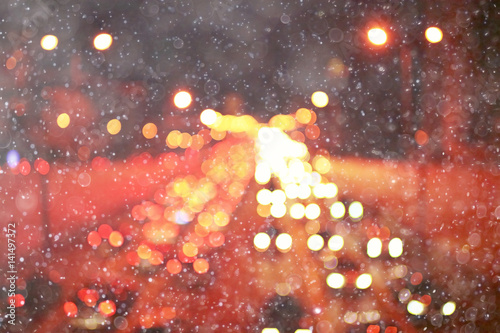 jams in the city night winter snowfall background