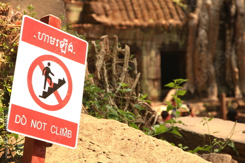 Do Not Climb Sign in Ta Prohm Temple, Cambodia