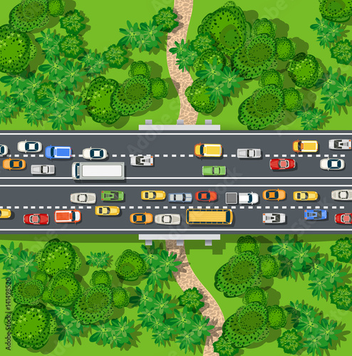 Expressway with a jam cork of cars and automobile in the nature with trees. Top view of city map
