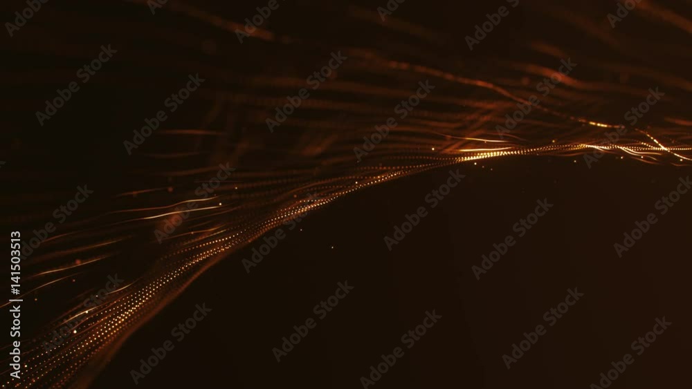 Loopable CGI animation of golden colored strings of particles glowing and flowing in dark digital space 