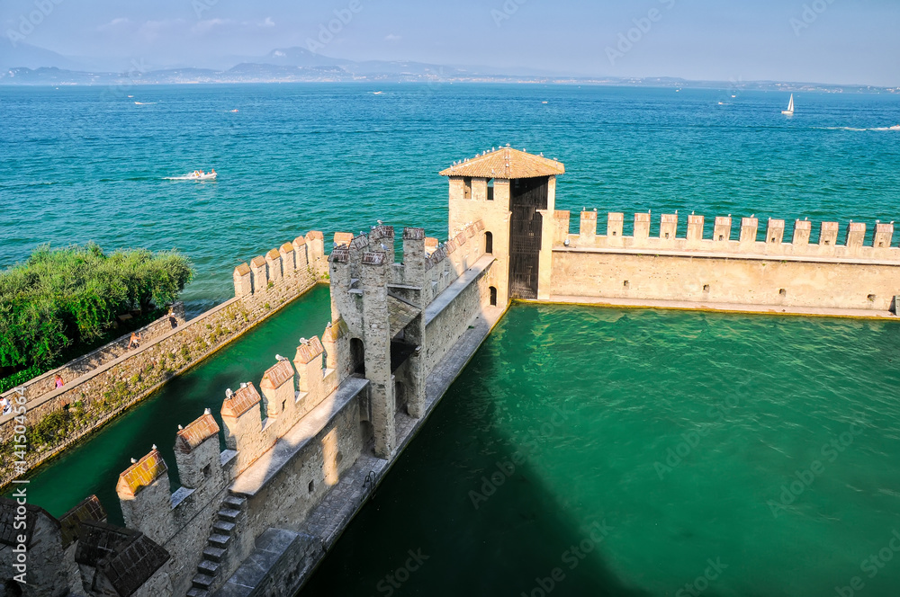 Wall of castle on lake Garda in Sirmione, Italy