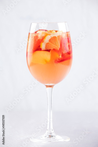 Apple  lemonade with oranges and strawberries