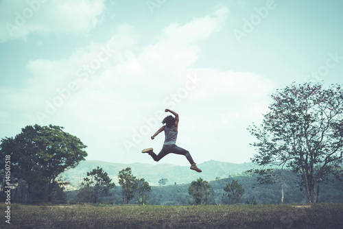 Jumping posture happy holidays Nature trails, forests, mountains