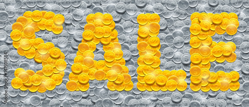 Vector word Sale made of shiny golden coins on background filled with silver coins.