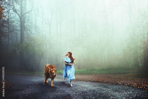 Composite image of lion and woman running on a street in forest photo