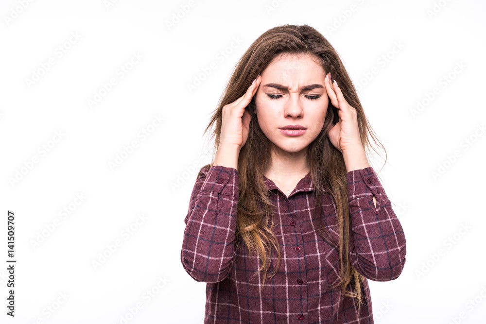 Fototapeta premium Portrait of a pretty woman in plaid shirt holds drawings in rolls stress and headache having migraine pain