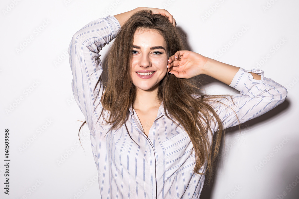 Naklejka premium Beautiful young girl. Studio shot on white background