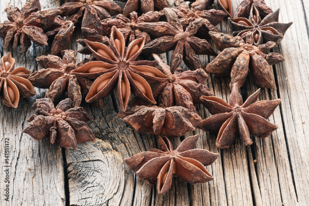 dried Anise seeds on wooden table close up dried Anise seeds on wooden table close up