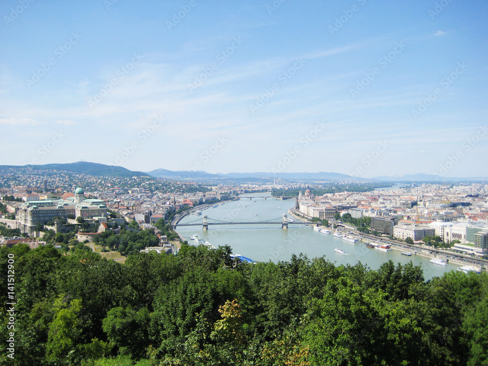 Beautiful view of Buda and Pest, eastern and western parts Budapest city, Hungary from up top Panorama with Danube river, the biggest river in Europe on sunny summer day with clear blue sky background