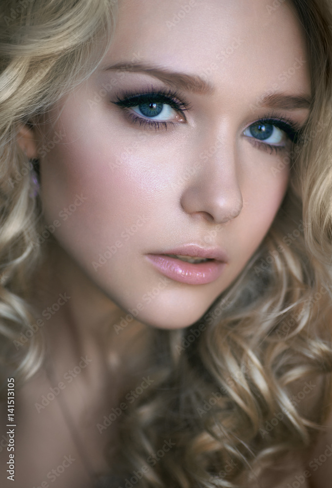 portrait of beautiful young blonde girl who looks in the frame portrait of beautiful young blonde girl who looks in the frame
